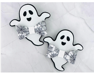 White and black ghost shaped hair bow, with spider web printed design on top. Bow is approx. 3 x 3. Bow is sold Individually.