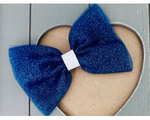Navy blue 4 x 3 glitter tulle hair bow. Brought together with a piece of white glitter faux leather.  Bow is sold individually.