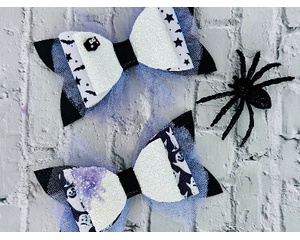 Two different styles of Black, white and lavender purple Halloween hair bows. See next photos for more details. Bows are sold individually. 