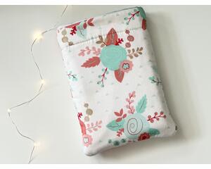 this floral book sleeve has a white background with pink and blue flowers and leaves all over it