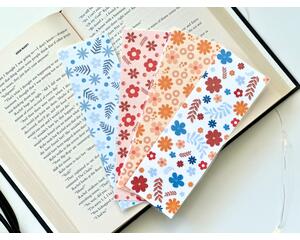 this floral bookmark set comes with four laminated bookmarks