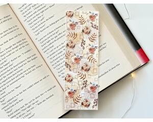 this rustic floral bookmark has a rustic brown background with rustic flowers and leaves with brown blocks