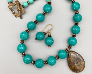 Necklace set | Bronzite teardrop pendant, 1980s Lucite faux-turquoise, mid-century Japanese glass beads, bronze "hearts" toggle