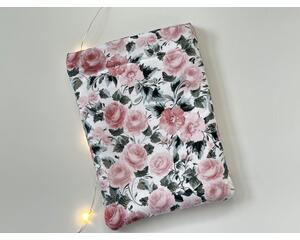 this floral kindle sleeve has a white background with pink flowers and green leaves