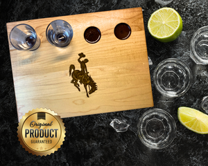12X9-IN. maple hardwood shot glass flight board featuring the Wyoming Cowboy logo in brown and gold resin. Perfect for bars, gifts, decor!