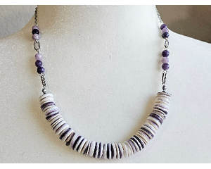 necklace with 1/2" in diameter white and purple shell button style beads, smaller faceted charoite gemstones, and a stainless steel chain 