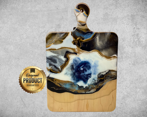 Maple charcuterie board with a resin and bison design, 24K gold accents, and a protective finish. Perfect for gifts or entertaining.