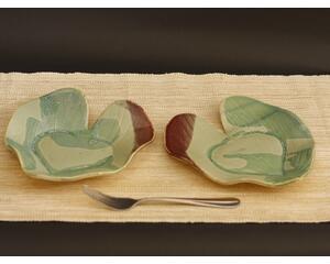 Bride & Groom's Table ceramic heart shaped dinner plate set with Hosta plant texture. Glazed in teal with maroon on adjacent edges. 8"x9"
