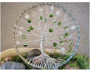 front of tree of life. branches ae made carefully by twisting and turning aluminum wire. decorated with green crackle glass beads