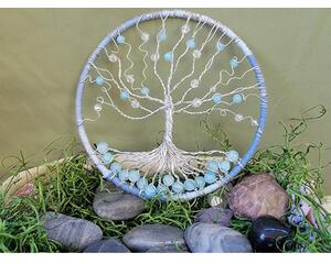 5 inch yarn wrapped hoop is the background for this wire tree adorned with various beads