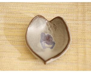 Ceramic heart shaped spoon rest. Glazed in grayish blue and purple colors. Approximately 3"x3.5"