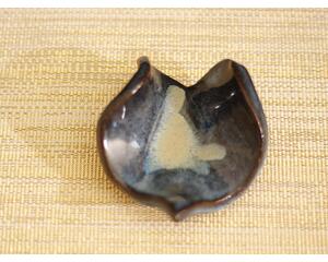 Ceramic heart shaped spoon rest. Glazed in blue and cream colors. Approximately 3"x3.5"