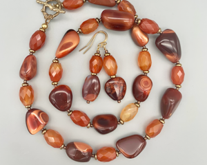 Necklace set | Graduated strand of Mexican Fire Opals with carnelian faceted ovals