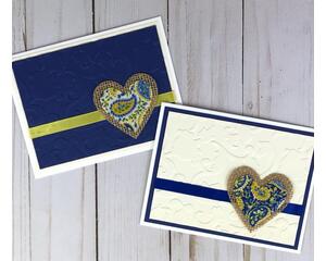 A set of embossed greeting cards with blue and cream cardstock, yellow and blue ribbons, and handcrafted burlap and paisley fabric hearts.