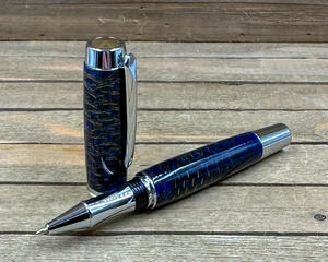 Blue resin and pinecone rollerball pen