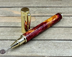 red and gold resin pen