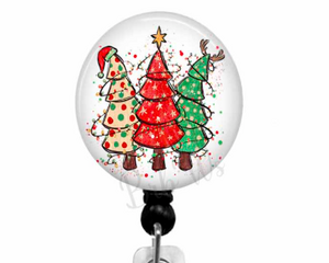 Christmas badge reel with 3 decorated Christmas trees