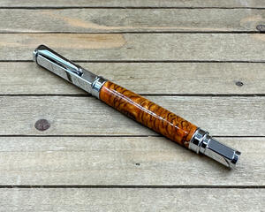 Orange resin and pinecone fountain pen