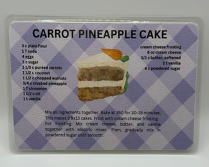 Carrot Pineapple Cake laminated recipe card showing watercolor picture of slice of cake on white and purple plaid background 