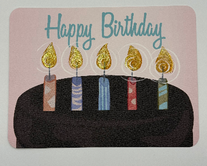 Watercolor chocolate cake with 5 birthday candles accented in shiny paint to make the flames really “glow”