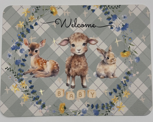 Baby shower card with plaid background featuring baby animals surrounded by blue and yellow flowers and crosses adorned in iridescent paint