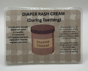 Homemade diaper rash cream recipe for teething babies, laminated card with cream and white plaid background 