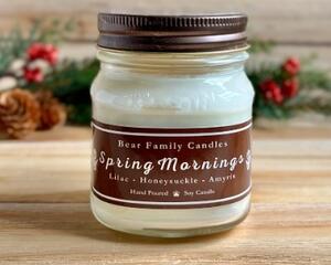 Lilac scented soy candle in 8oz mason jar.