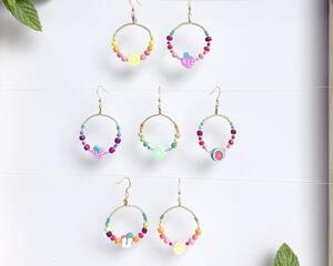 Fun and colorful fruit earrings:  lemon, strawberry, watermelon, grape, apple, kiwi and grapefruit. 1" x 1 3/4". Front & back look the same.