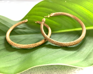 Golden grass large hoop earrings with gold plated ear posts.