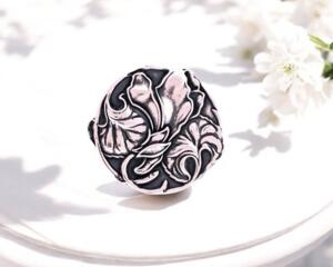 Silver button for jewelry designers with a leaf motif