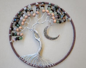 This is a close up front view of the night breeze tree of life wall hanging