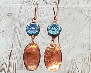 Handmade earrings with blue Czech glass flower beads and hammered copper dangles, romantic artisan jewelry, 1.5 inches long.
