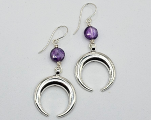 Handmade earrings with amethyst coin beads and stainless steel crescent moons, Argentium sterling ear wires, 2.25 inches long.