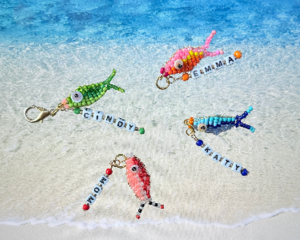 Cute and vibrant personalized fish charm for purses, backpacks, keychains, etc. Optional colors are green, blue, orange/pink, and red.