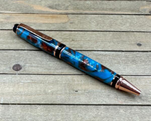 Bright copper cigar pen made with turquoise and copper resin