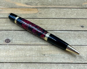 Dark fuchsia and black epoxy resin cast pinecone pen