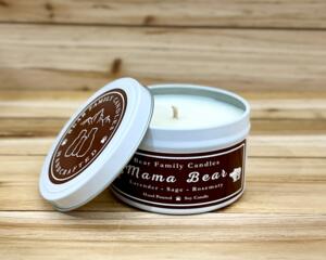 Lavender and rosemary scented soy candle in 6oz tin with lid off.