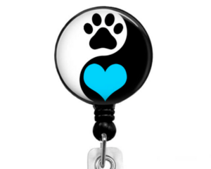 Paw print with blue heart on black reel