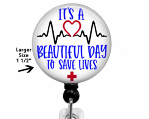 Badge reel with a Velcro badge top that can be placed on a reel and changed for a different top when desired.