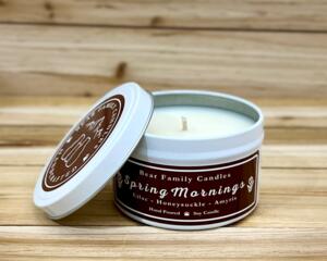 Lilac scented soy candle in 6oz tin with lid off.