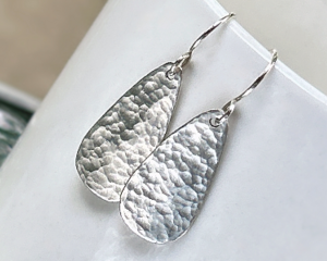 Hammered sterling silver teardrop dangle earrings by MariesGems.