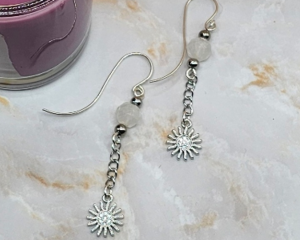 2-inch earrings with platinum sun charms, moonstone beads, and silver ear wires, handcrafted with celestial sparkle