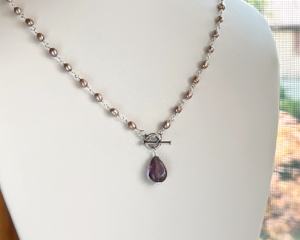 Taupe pearl and amethyst necklace with front toggle clasp in sterling silver by MariesGems.