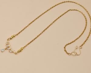 Gold-tone vine link pendant with cubic zirconia teardrop charm.