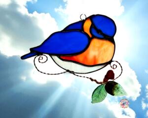 Bluebird suncatcher in direct sunlight.