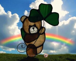 Saint Pat's Bear stained glass suncatcher in brown glass with dark green shamrock.