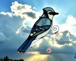 Blue Jay by Robin C. Hary- made with shades of blue, black, and white glass.