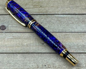 Royal purple resin pen with pinecones