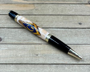 Square and compass on curly maple wood