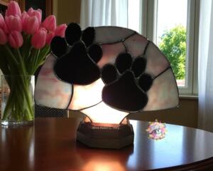 Paw Print Stained Glass Fan Lamp by Robin C. Hary- shown in Pink.